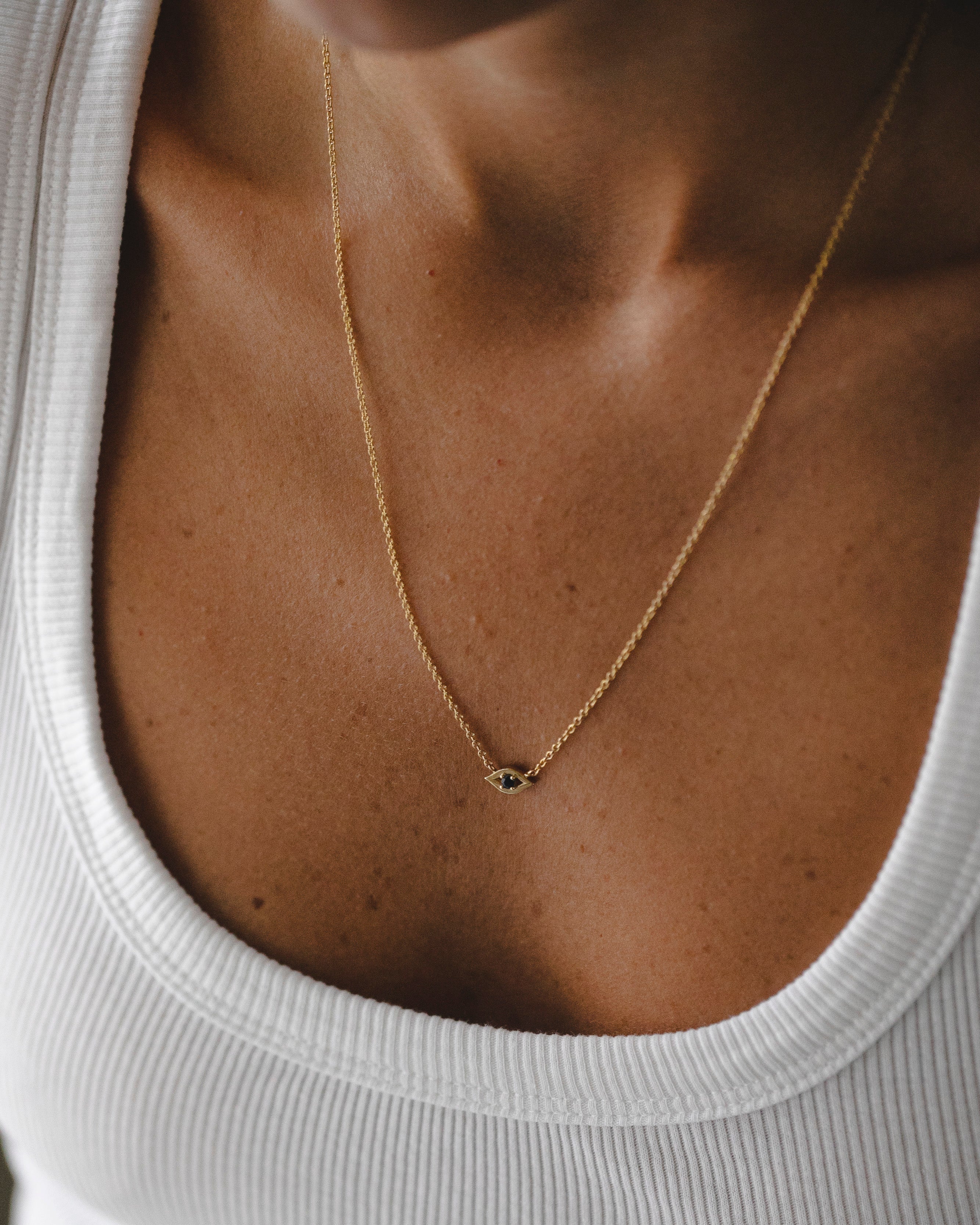 Evil Eye floating Gold Necklace sapphire