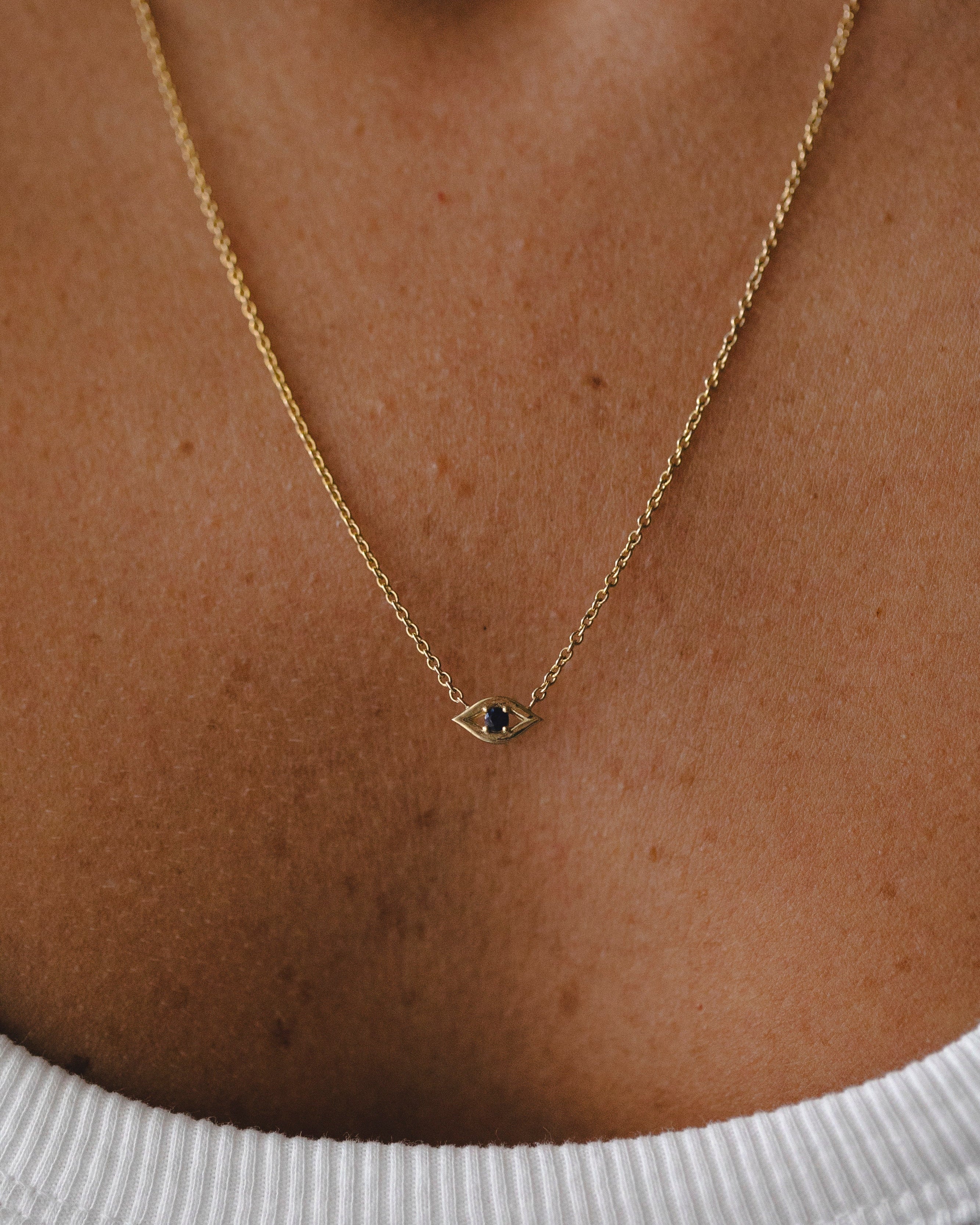 Evil Eye floating Gold Necklace sapphire