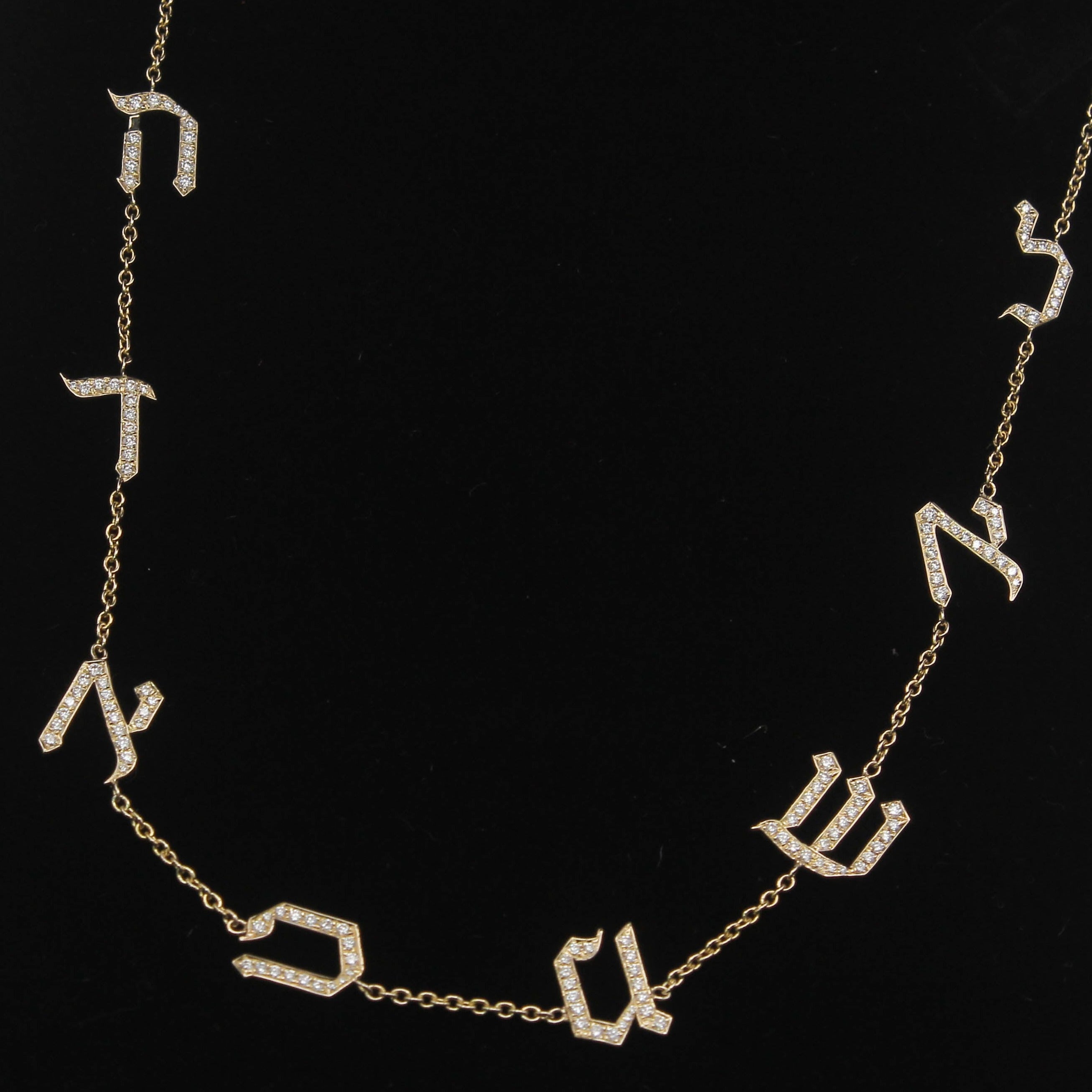 Eight letters necklace set with diamonds