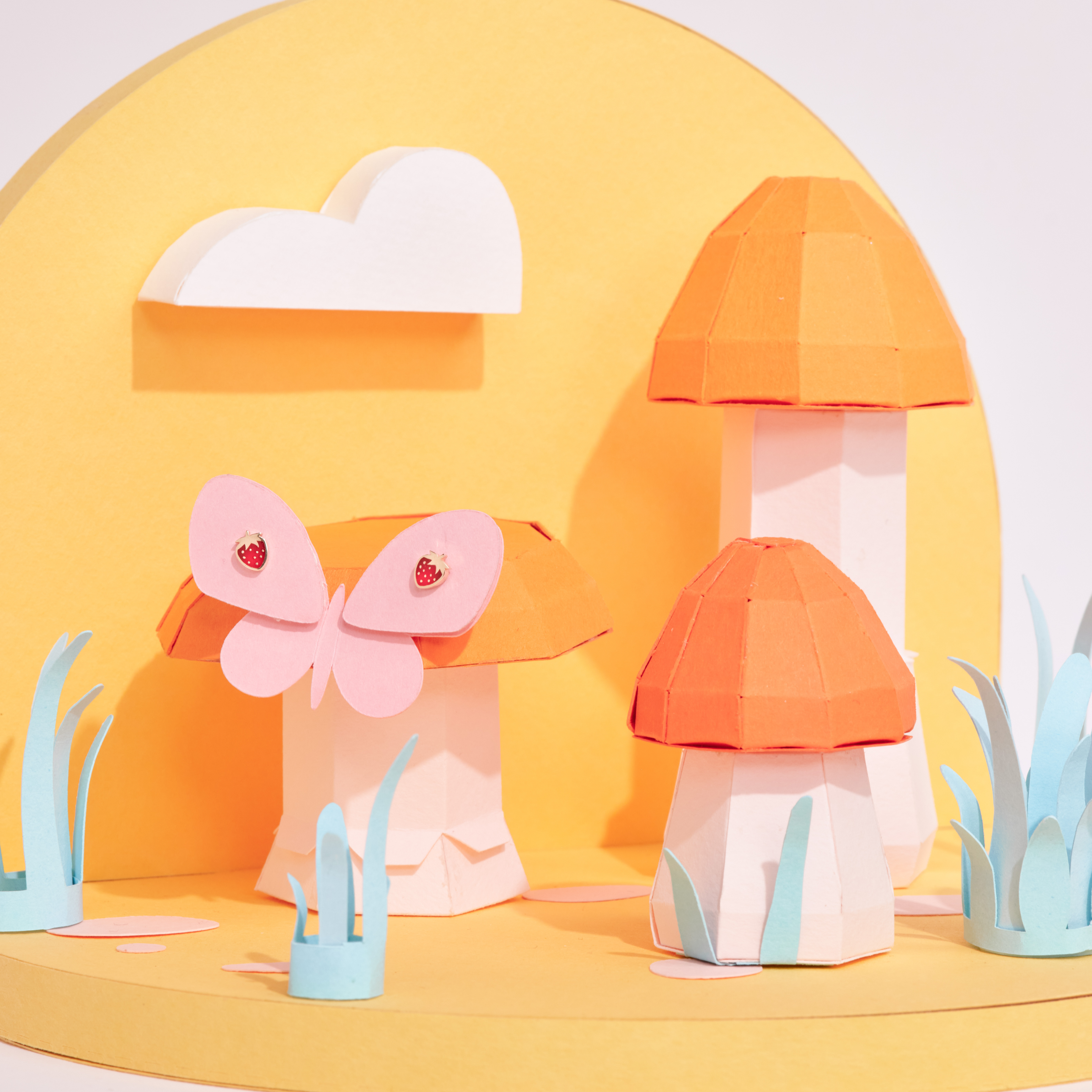 Red strawberry earring with gold dots