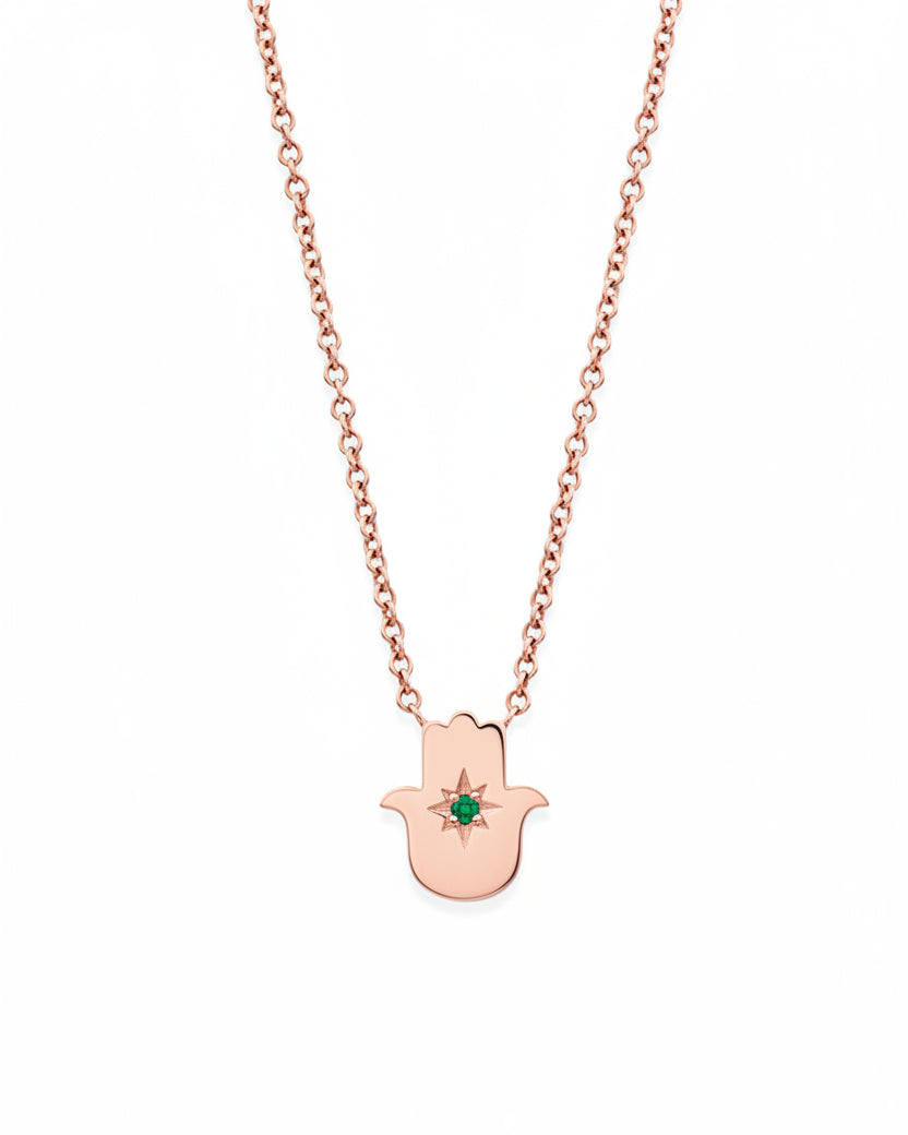 Floating Hamsa gold necklace with Emerald