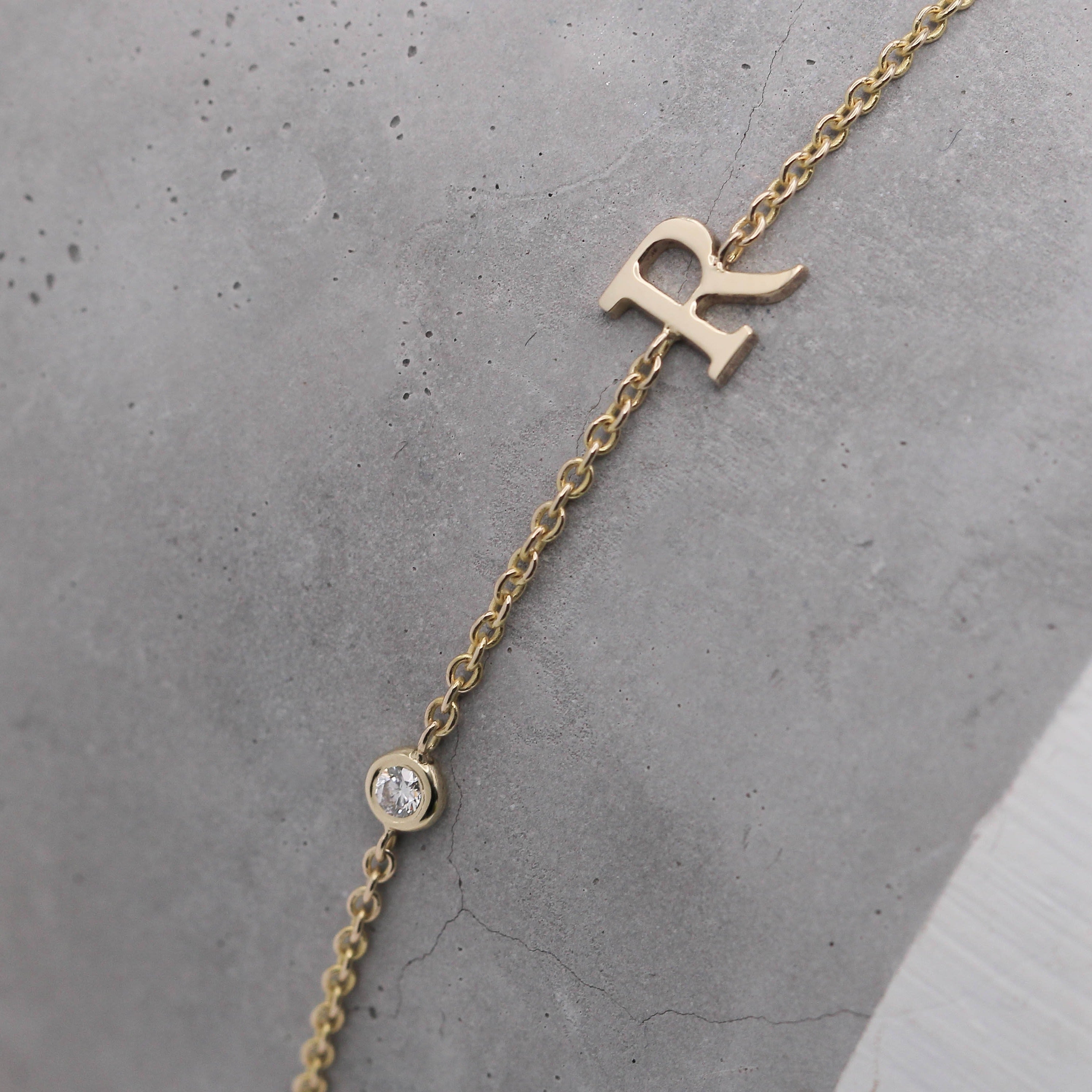 Letter & diamond gold bracelet