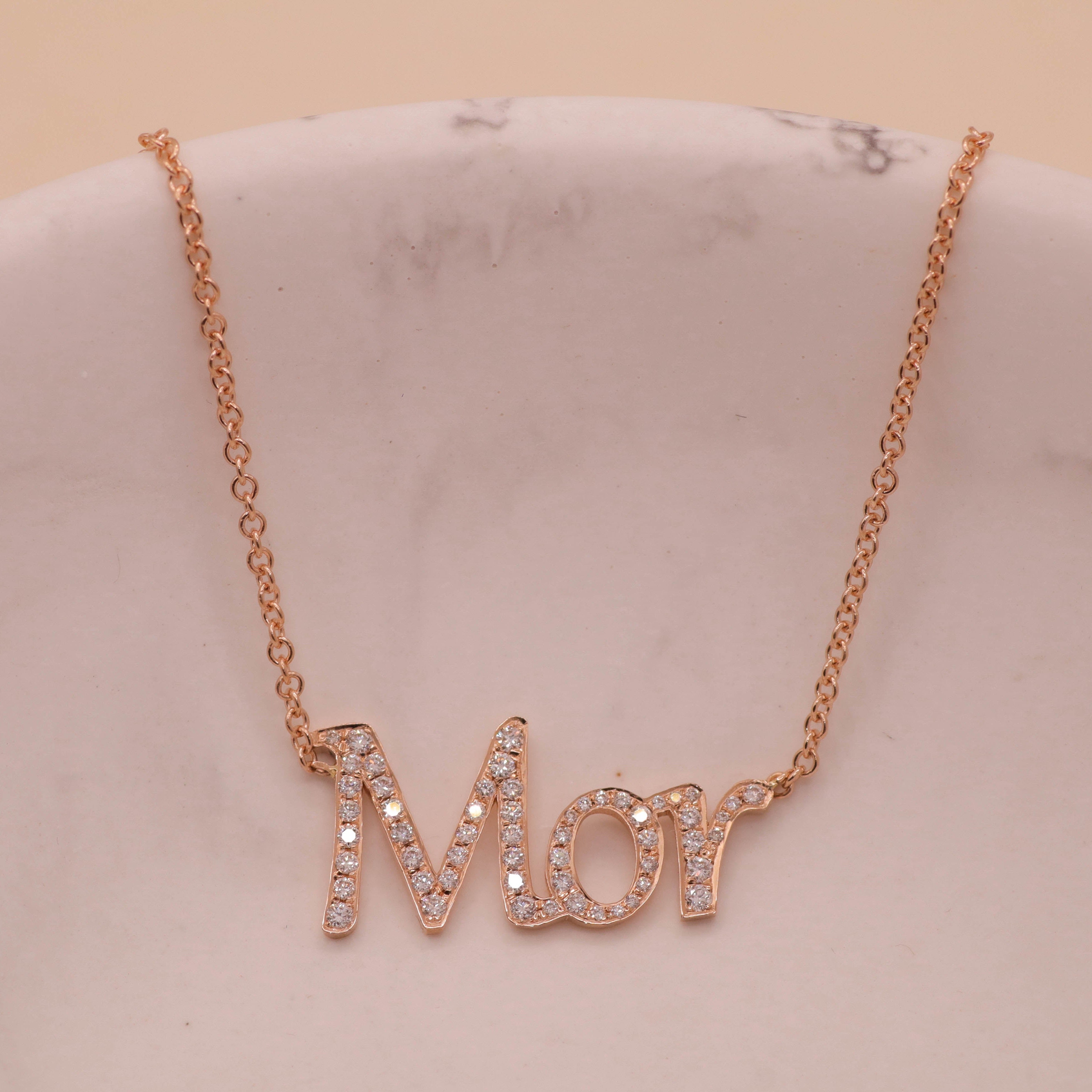 Name necklace set with diamonds