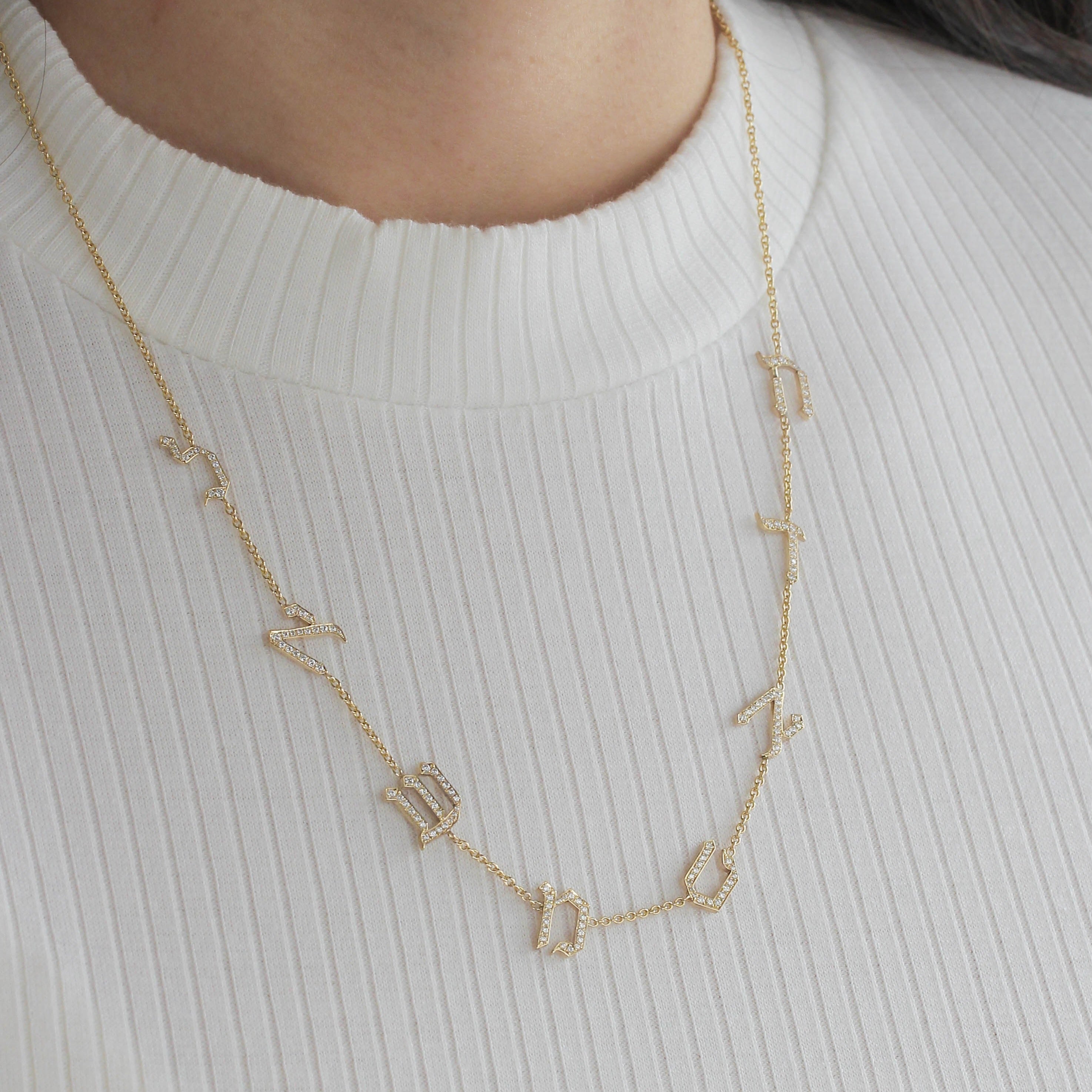 Eight letters necklace set with diamonds