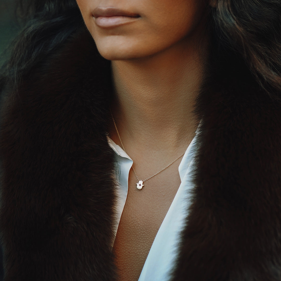 Floating Hamsa gold necklace with gem stone Ruby