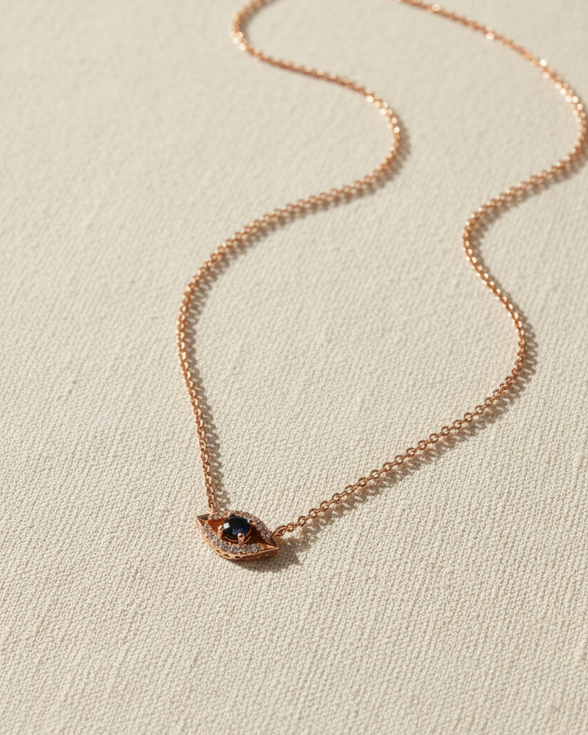 Evil Eye floating Gold Necklace Sapphire and Diamonds