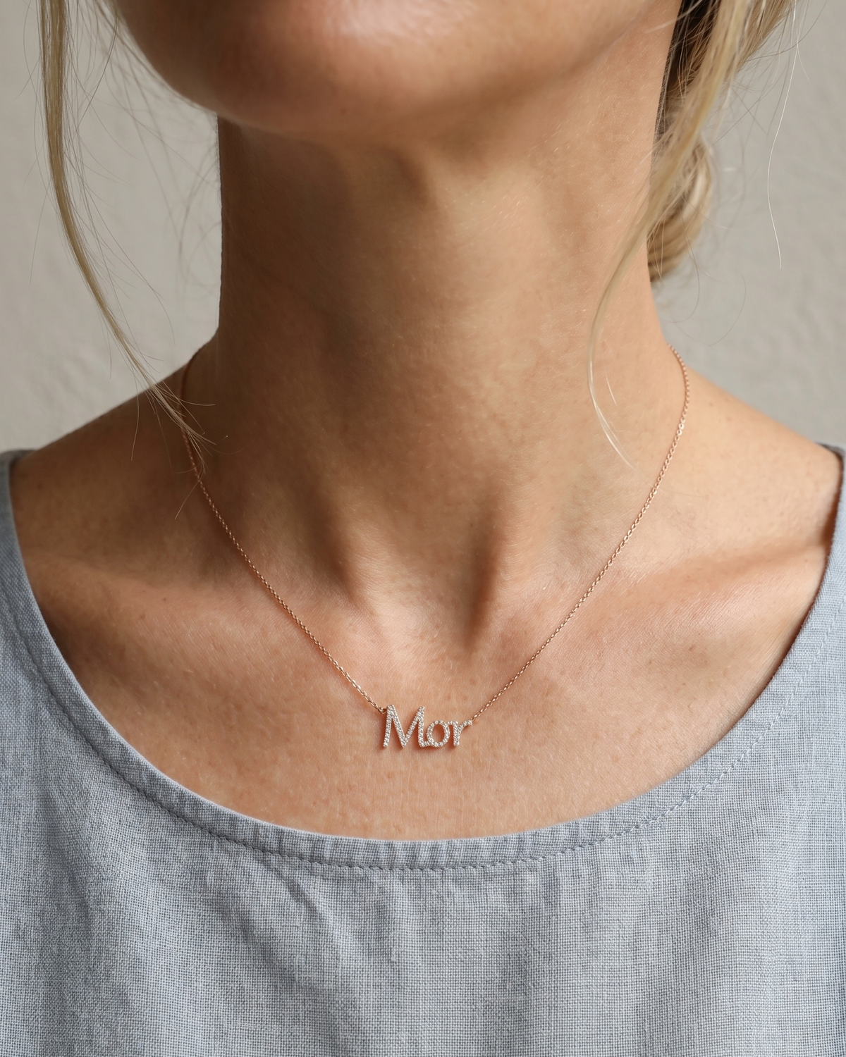 Name necklace set with diamonds