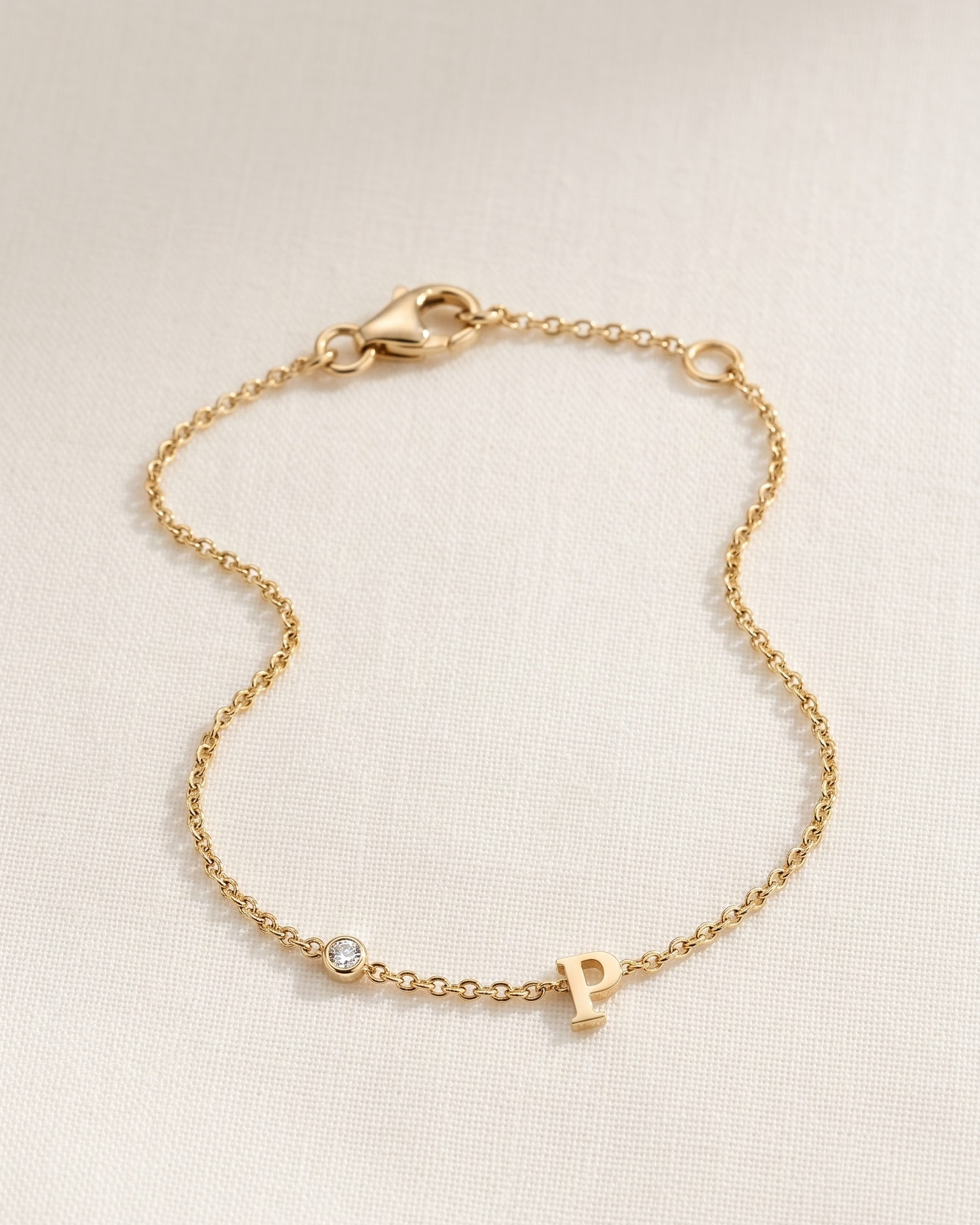 Letter & diamond gold bracelet