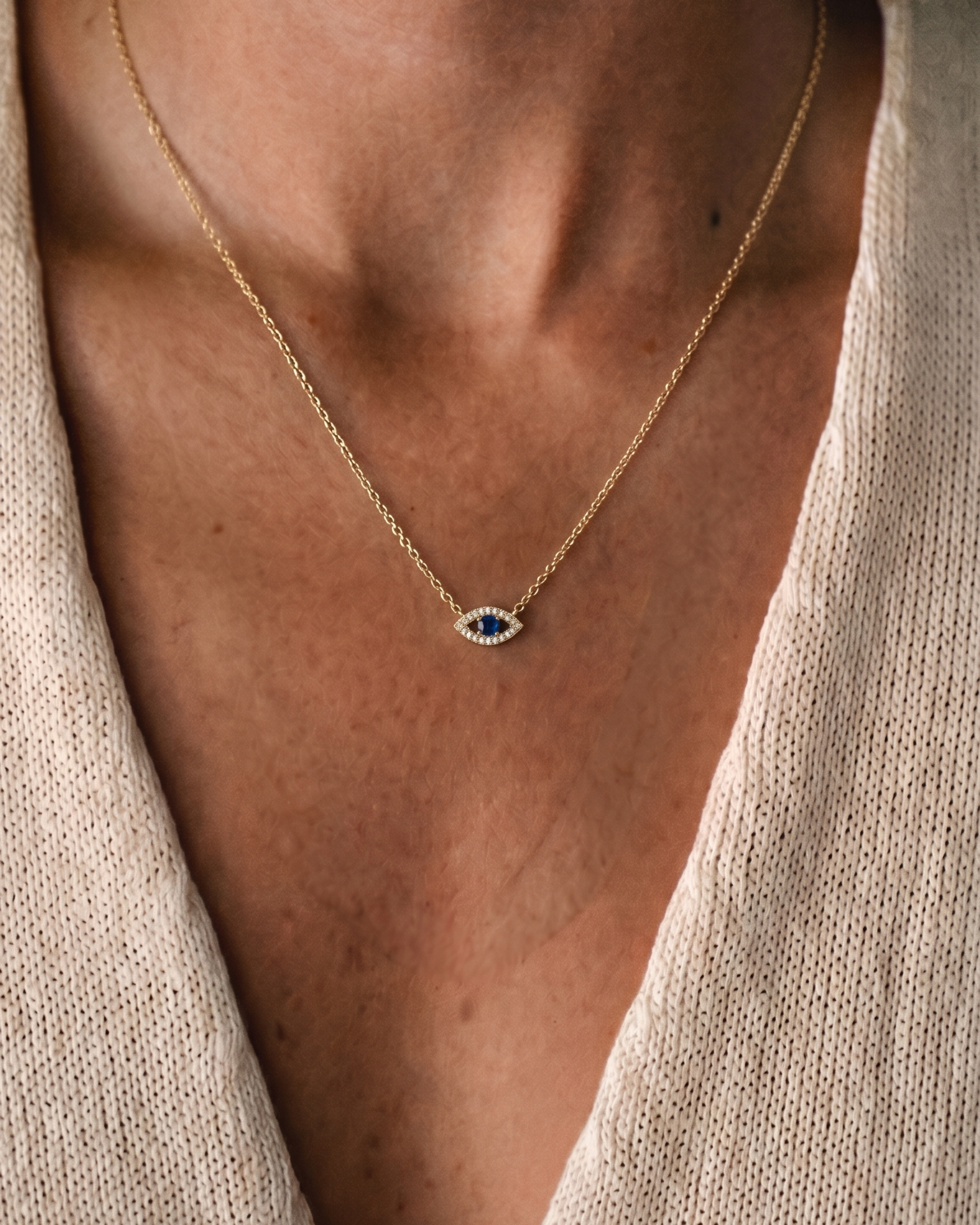 Evil Eye floating Gold Necklace Sapphire and Diamonds