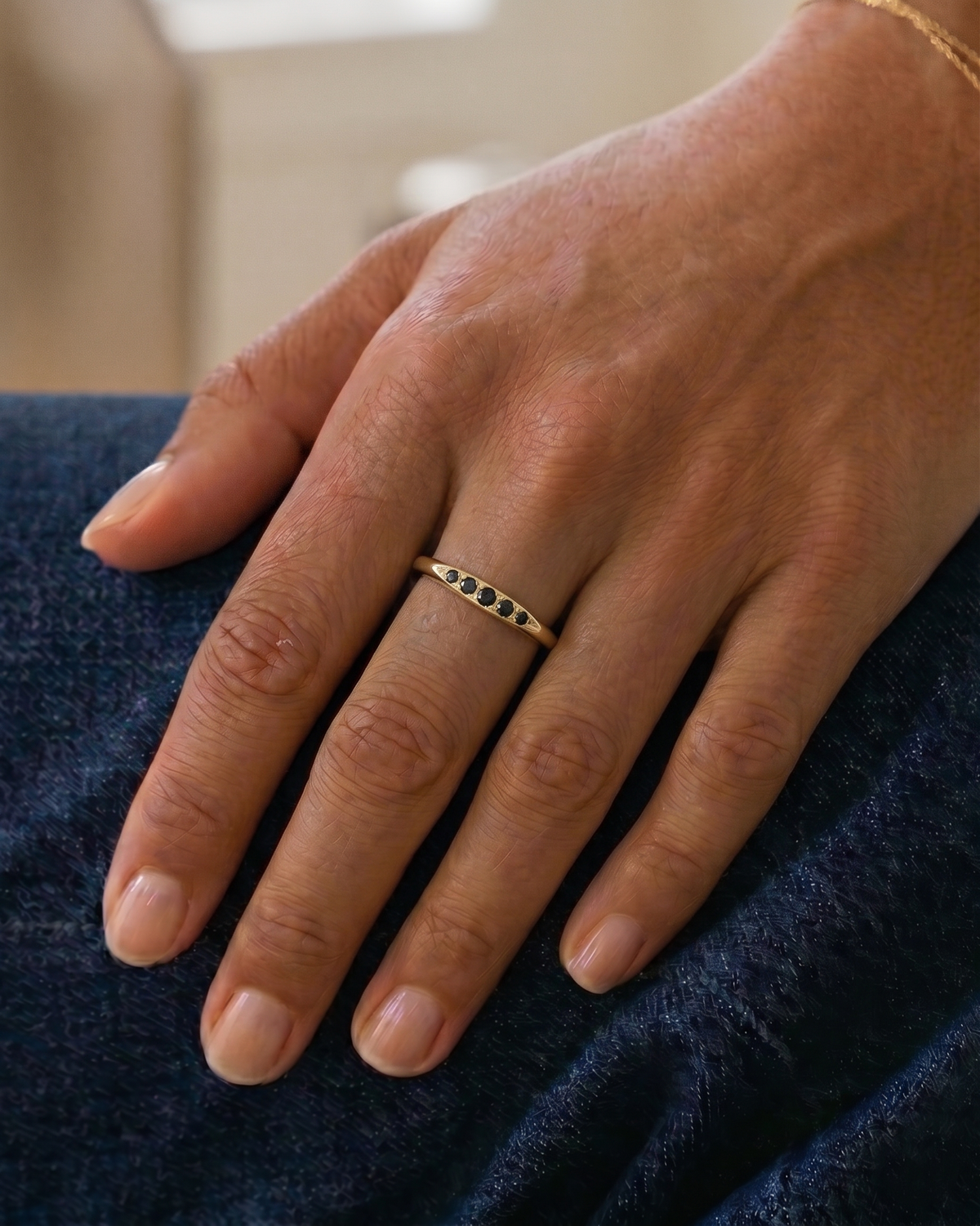 Jackie Gold Ring Five black Diamonds