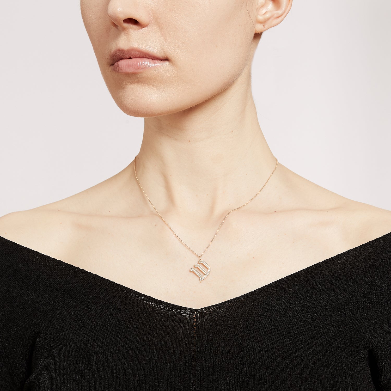 gold necklace encrusted letter hebrew