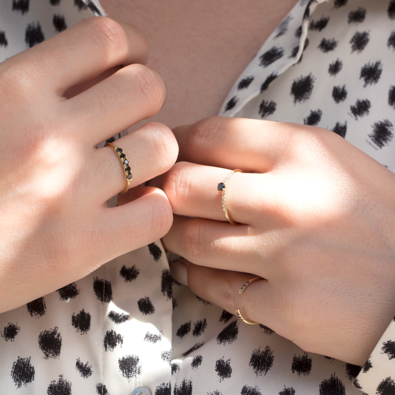 gold bar ring with black diamonds