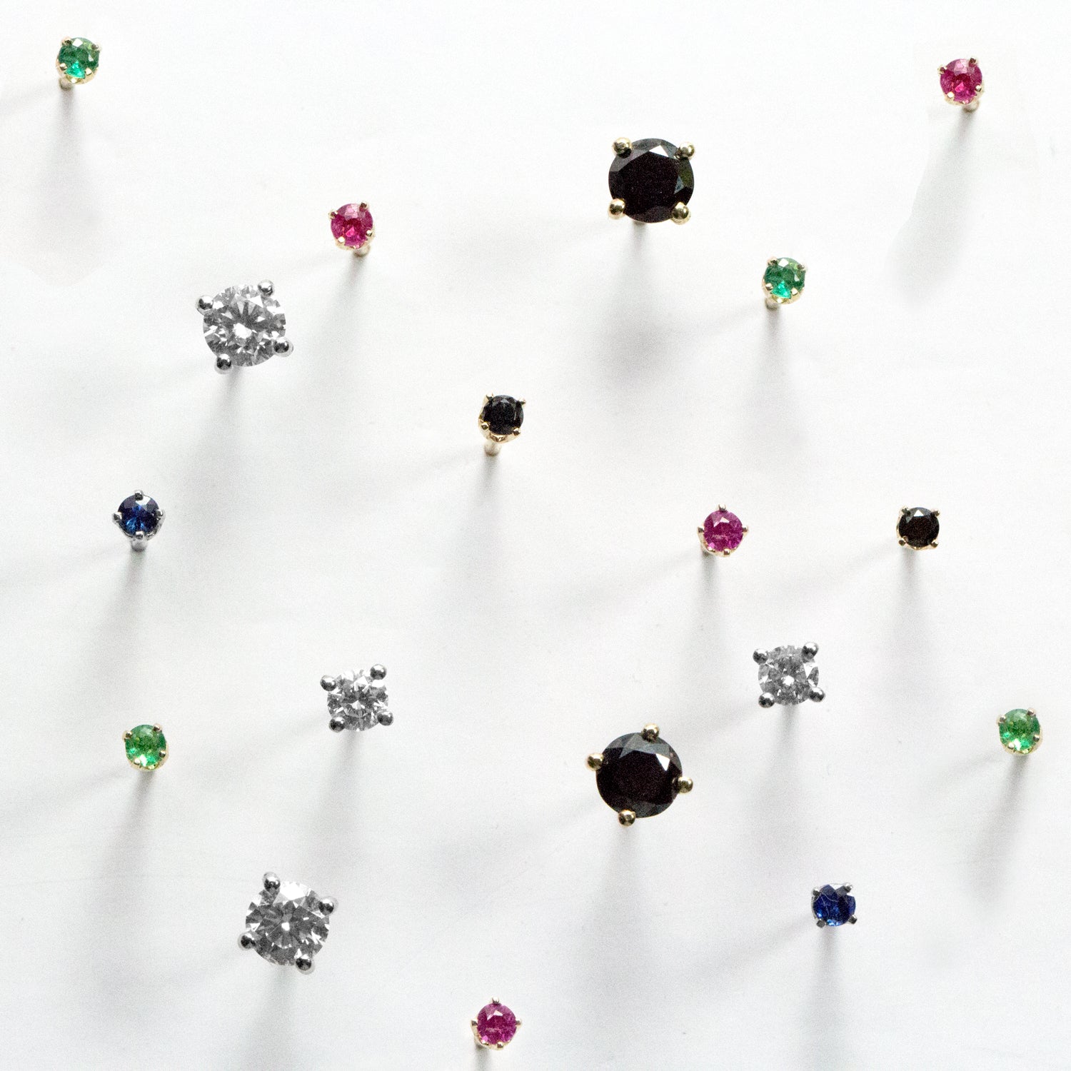 green stone gold earrings