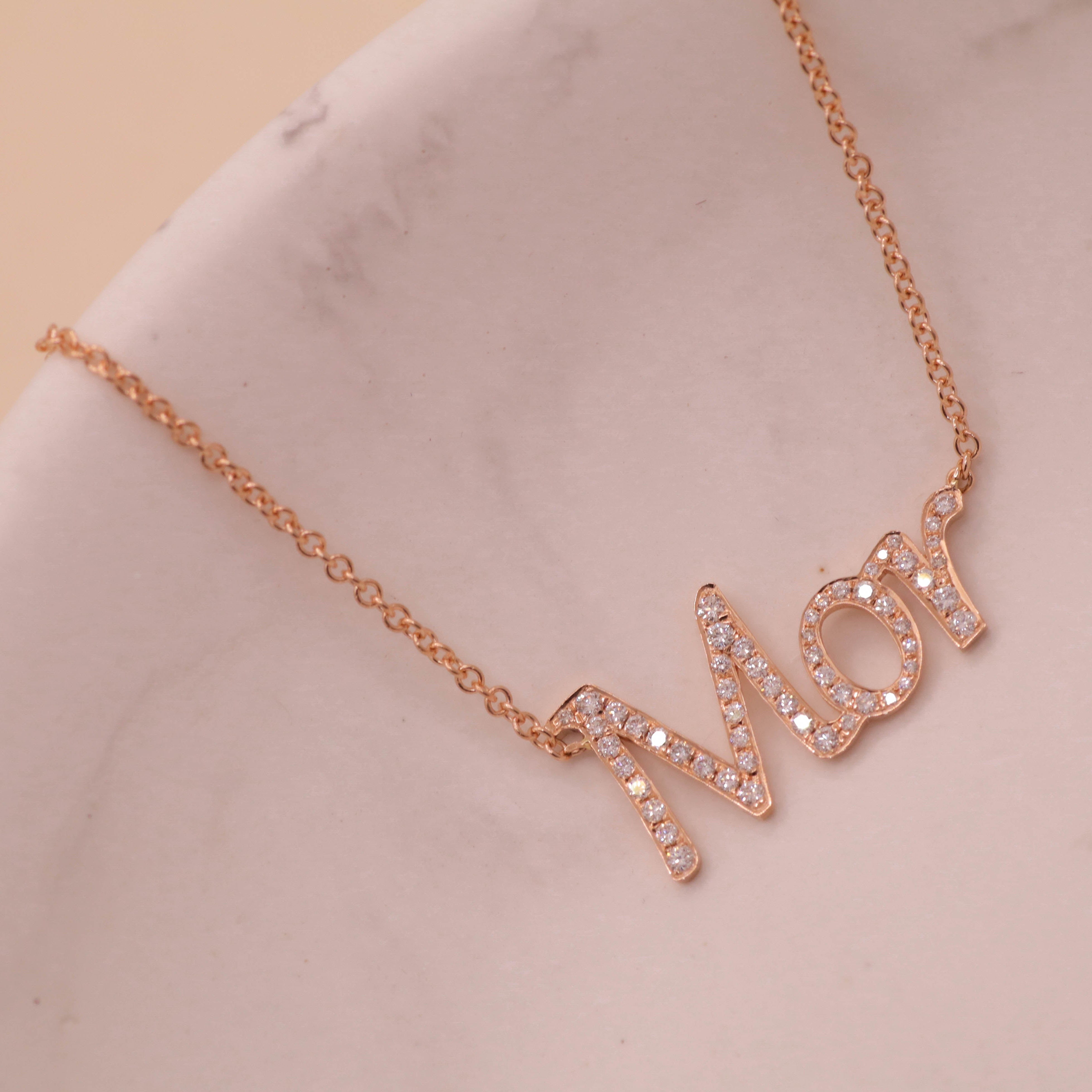 Name necklace set with diamonds