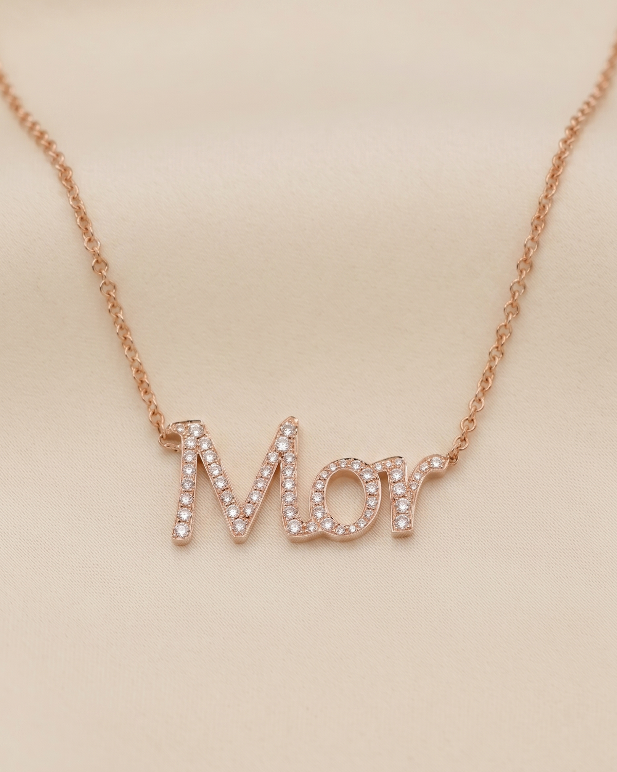 Name necklace set with diamonds