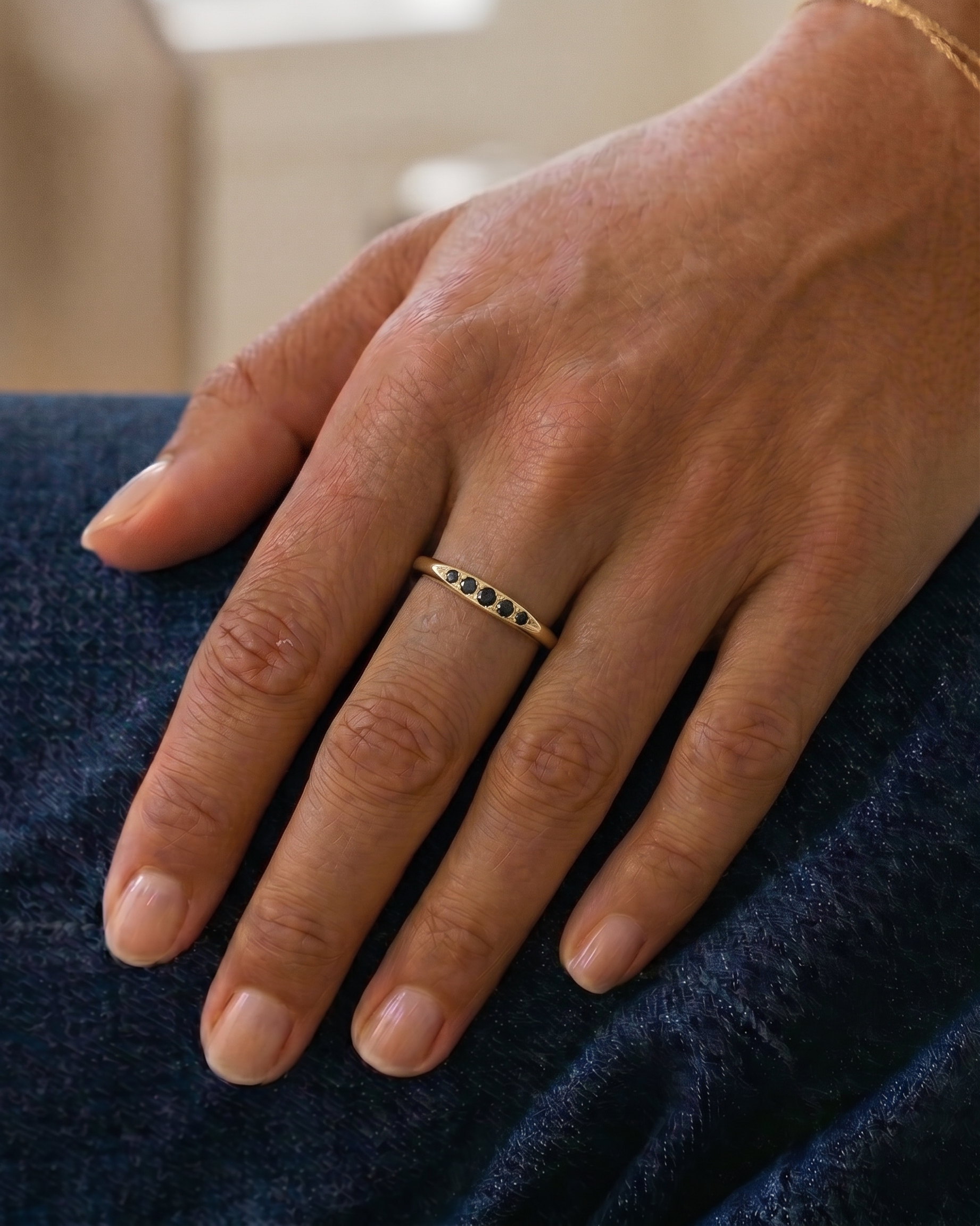 Jackie Gold Ring Five black Diamonds