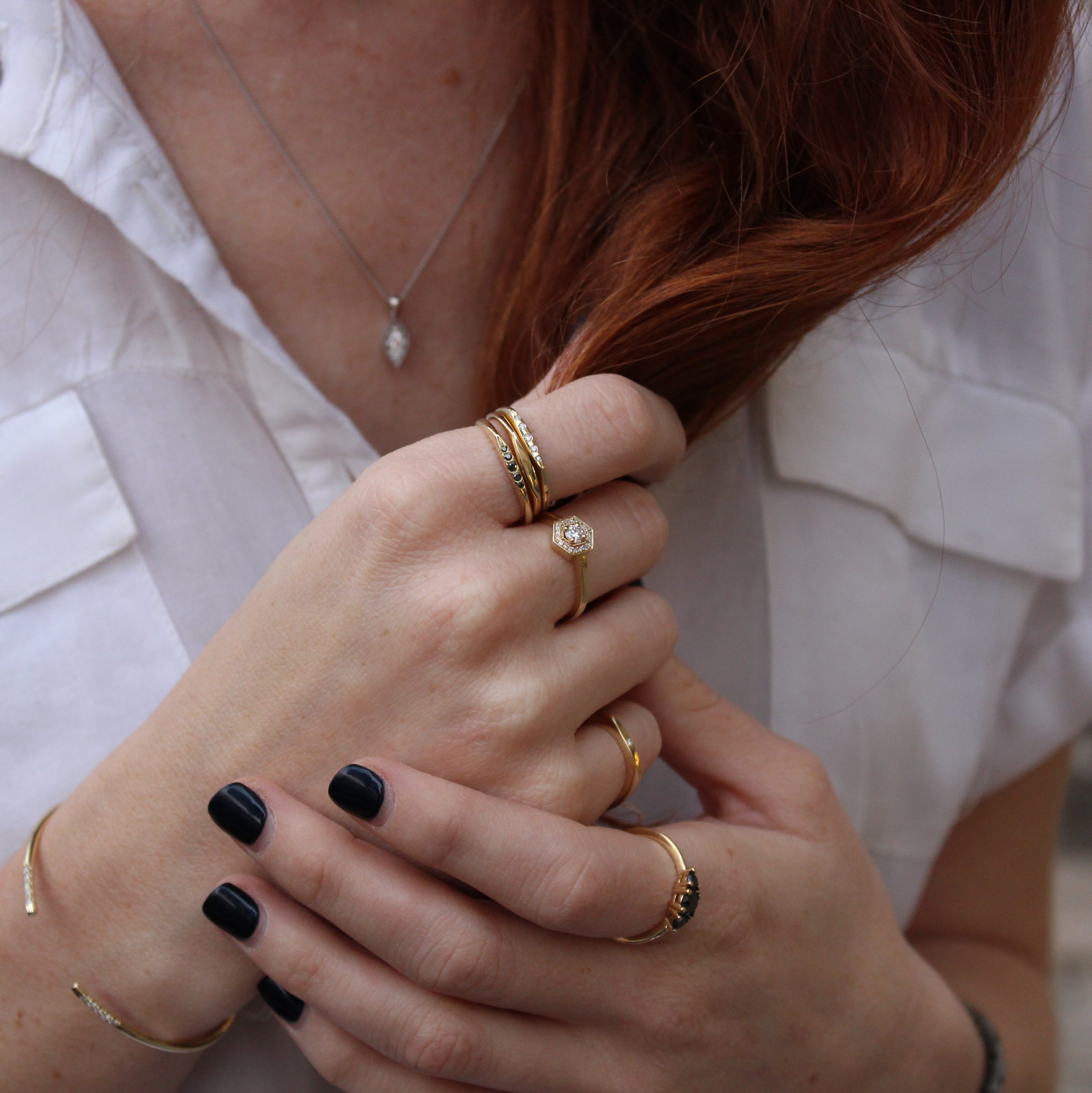 Jackie Gold Ring Five black Diamonds