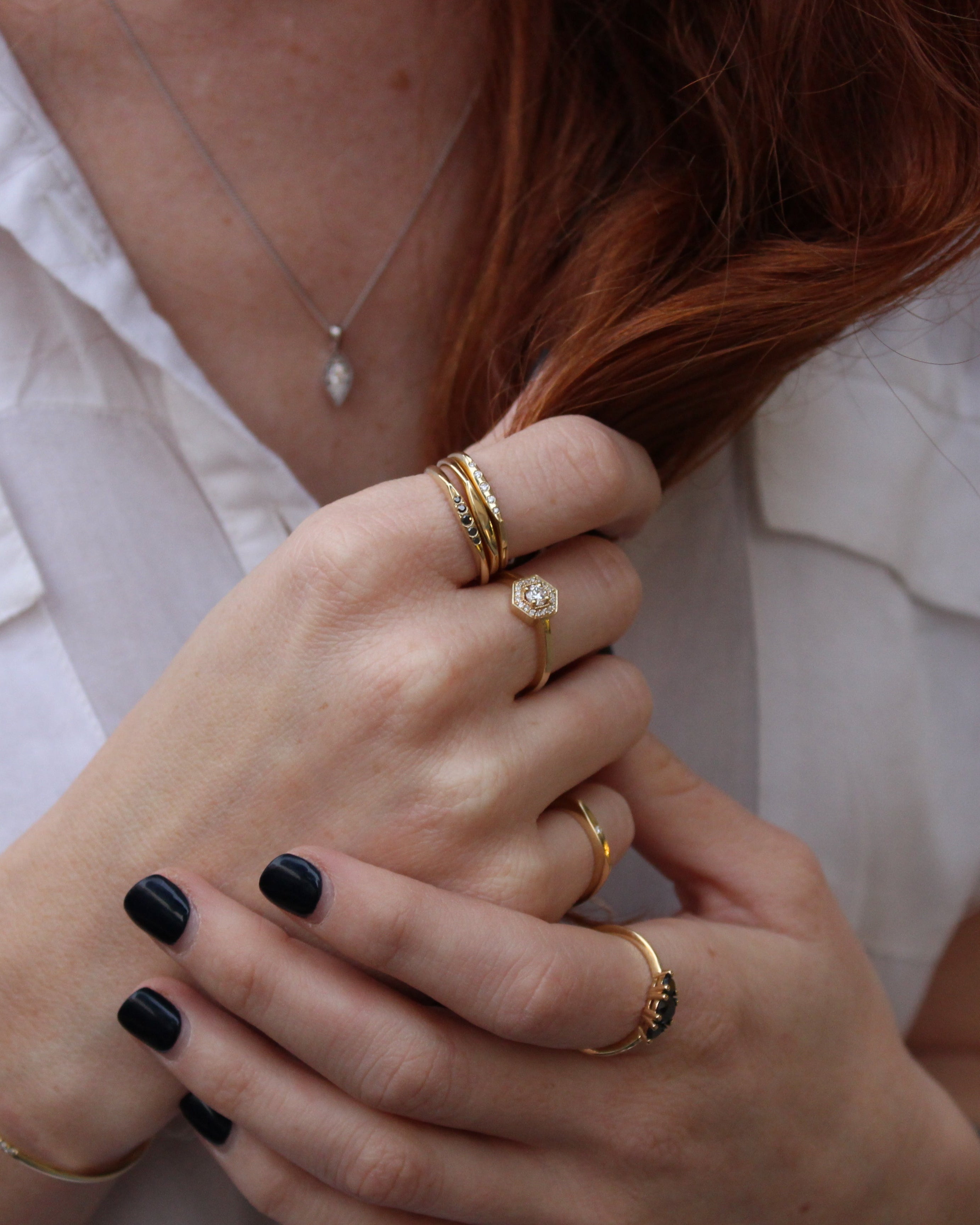 Jackie Gold Ring Five black Diamonds