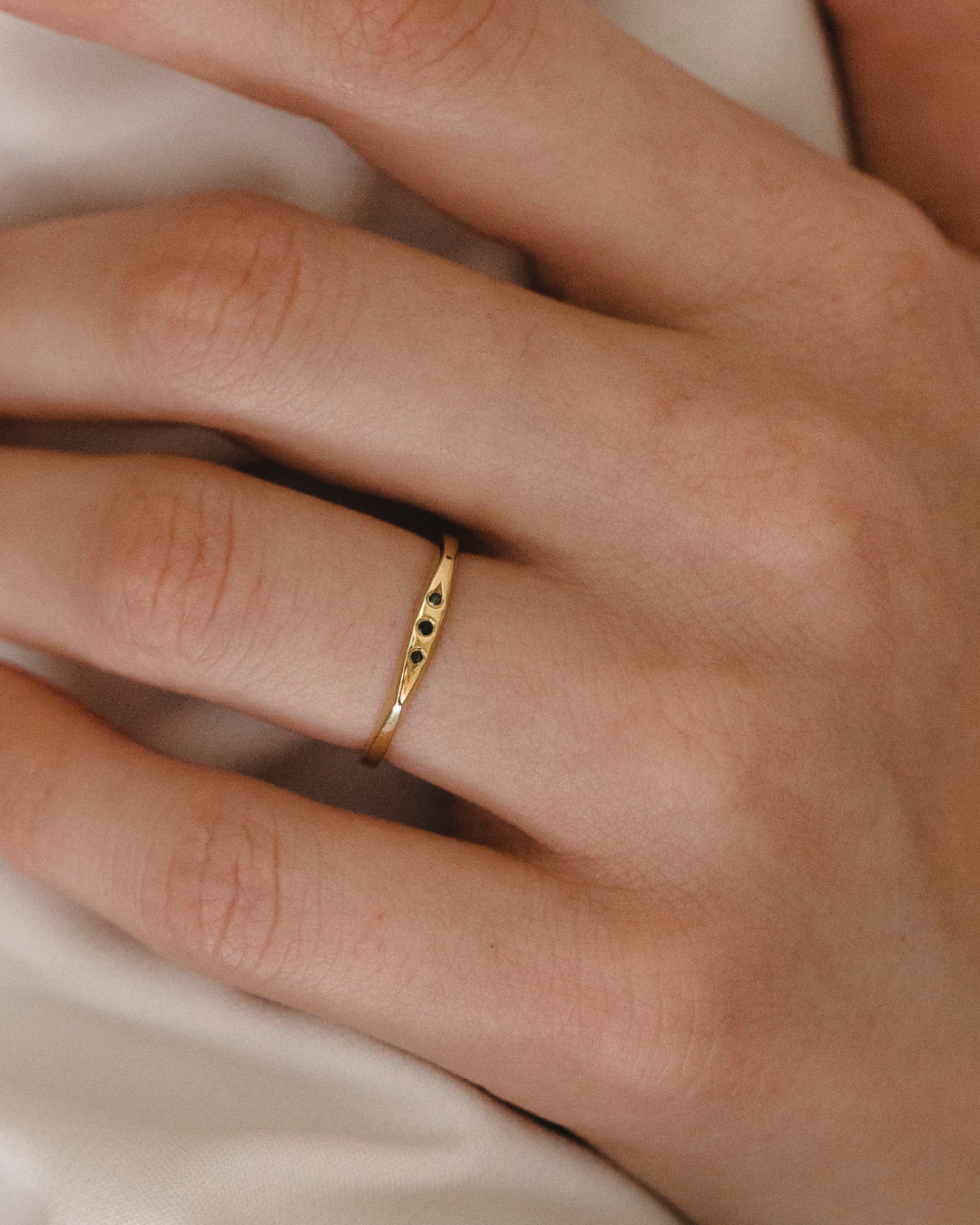 Jackie Gold Ring Three Black Diamonds