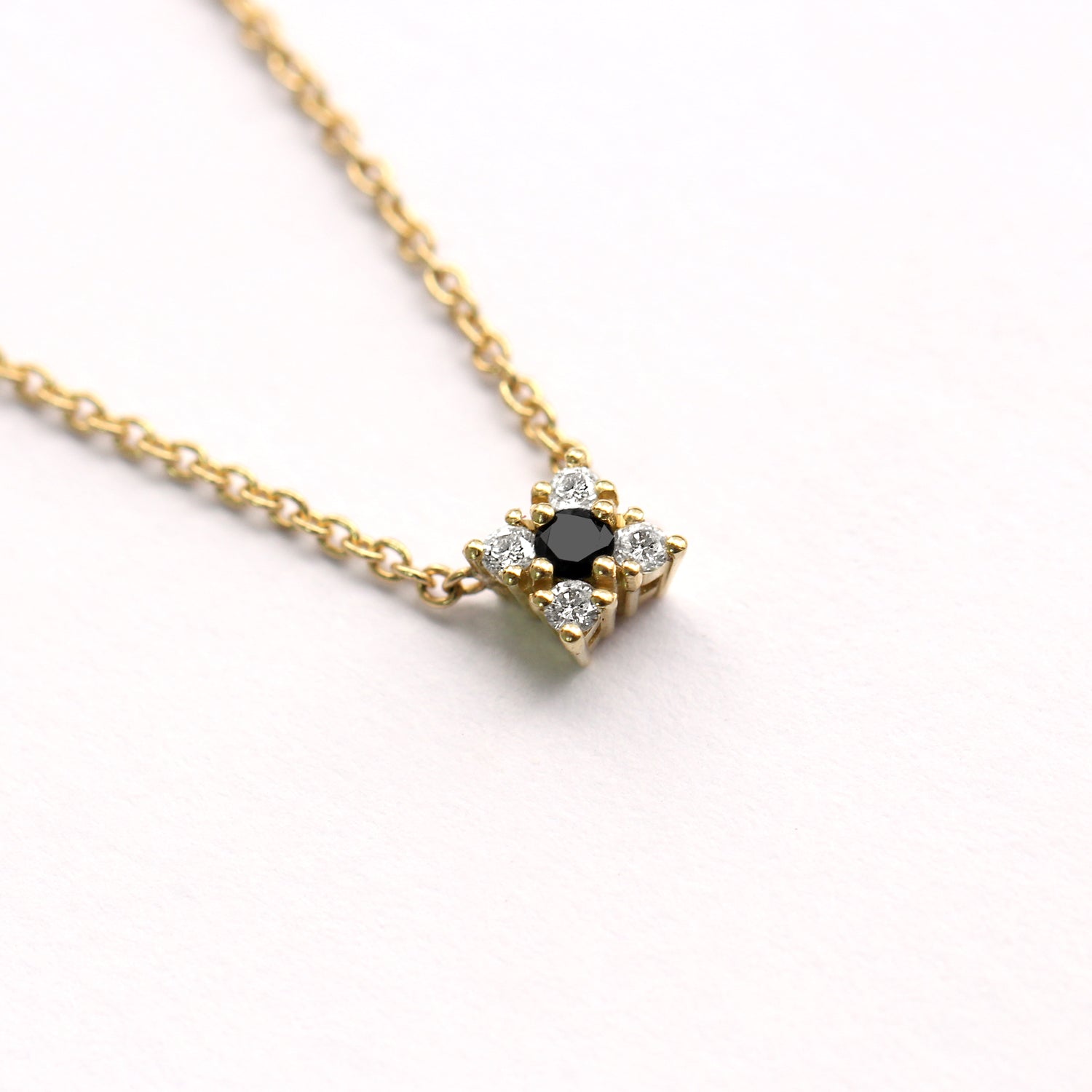gold necklace with flower of diamonds