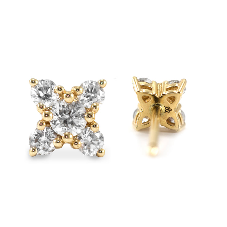 five white diamonds on gold earrings