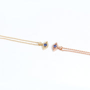 gold necklace against evil eye