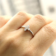 white gold ring with white round diamonds