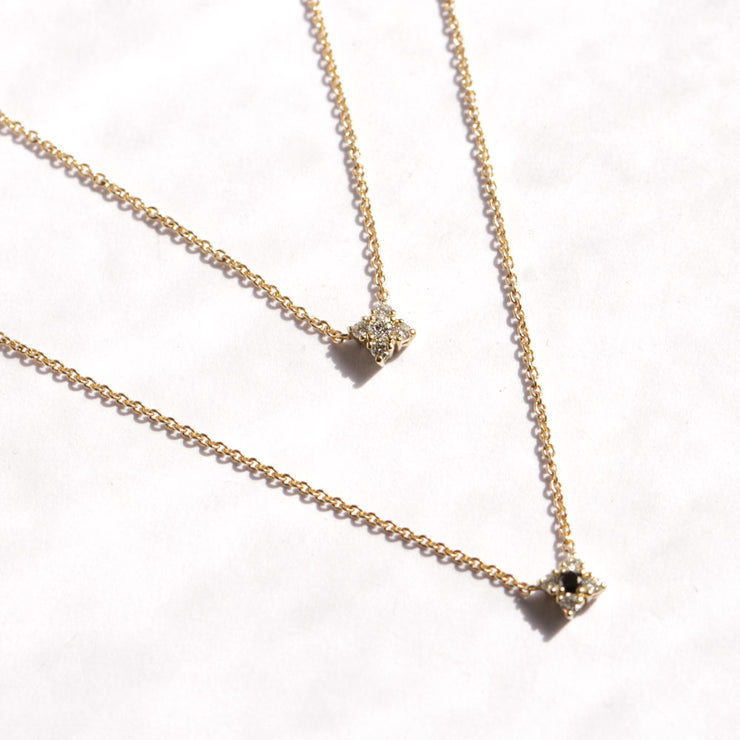 gold necklace with flower of diamonds