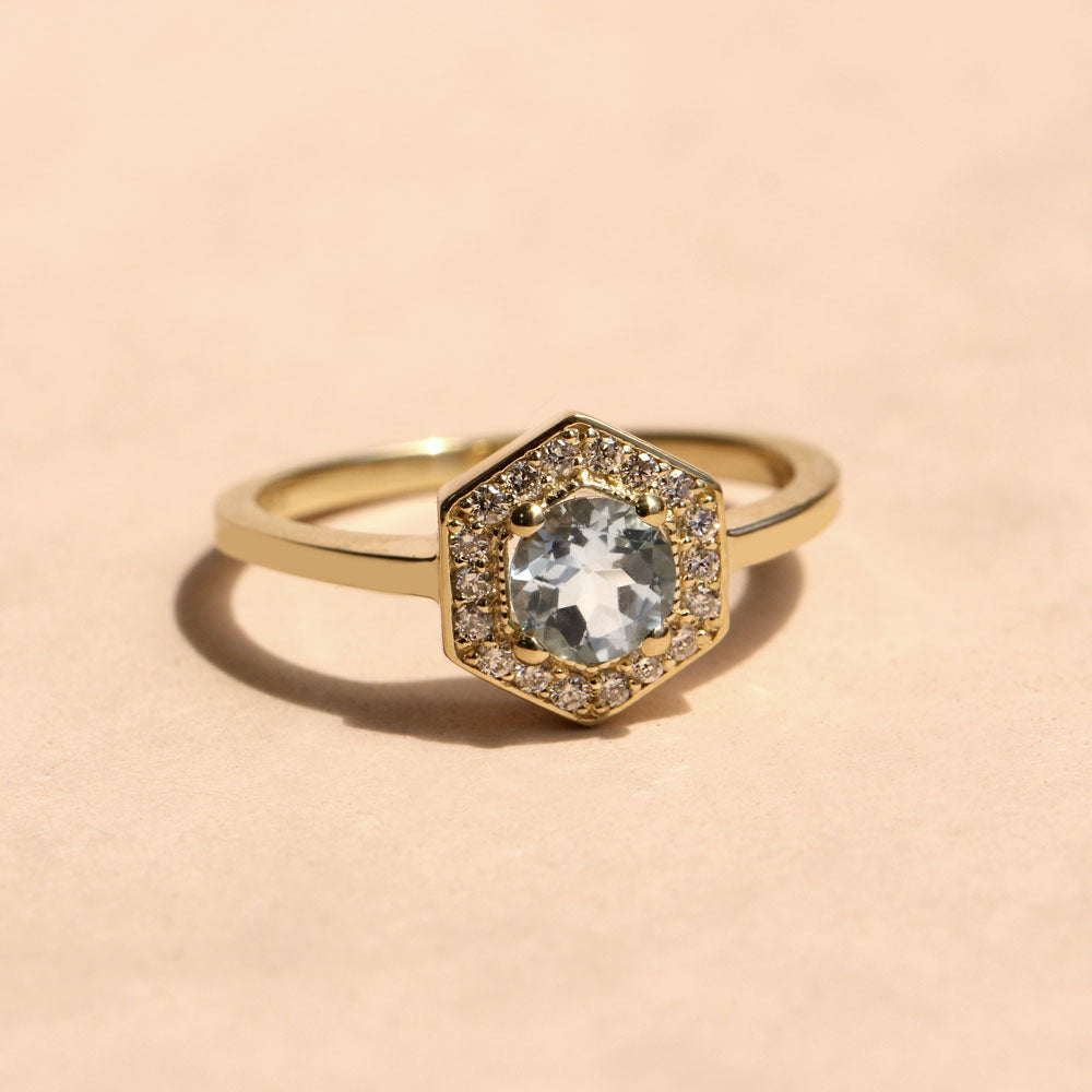 halo ring with aquamarine and diamonds