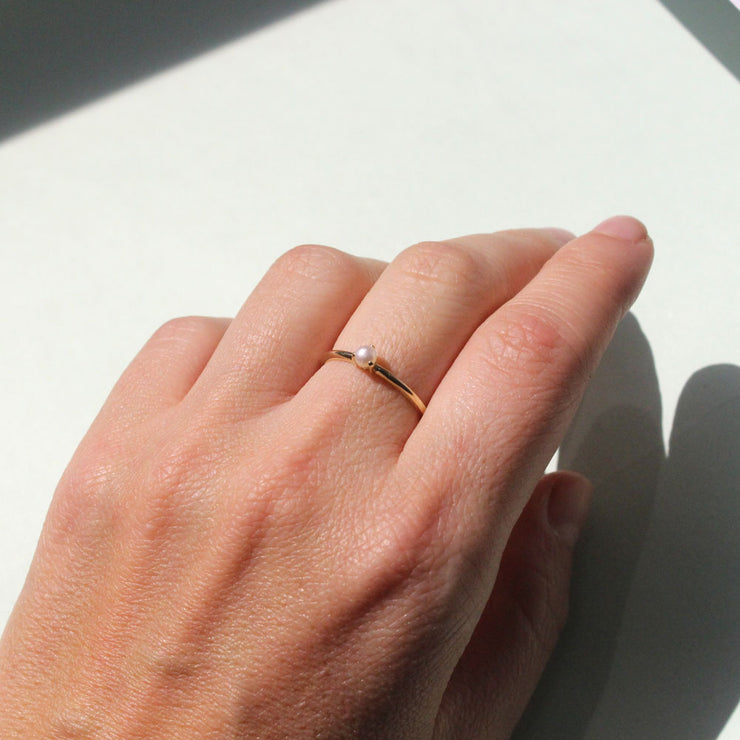 thin gold ring with pearl