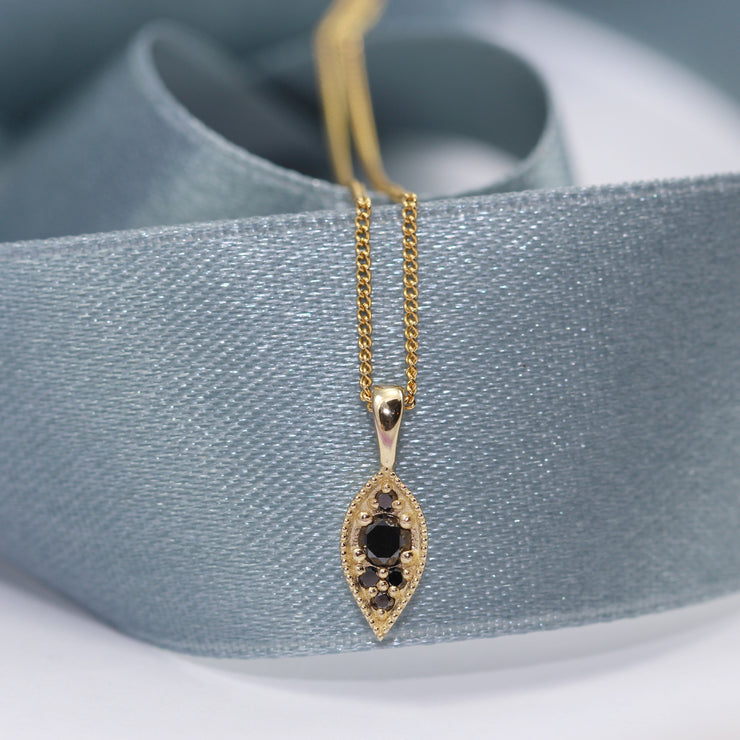 marquise pendant with black diamonds