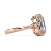 rose gold halo ring with aquamarine