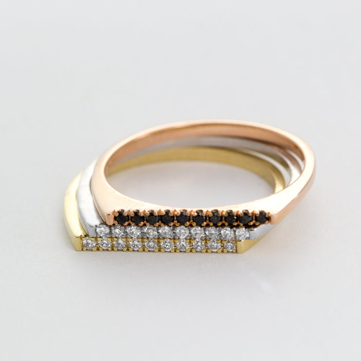 yellow gold thin ring with black diamonds