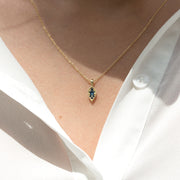 gold necklace with sapphire stones