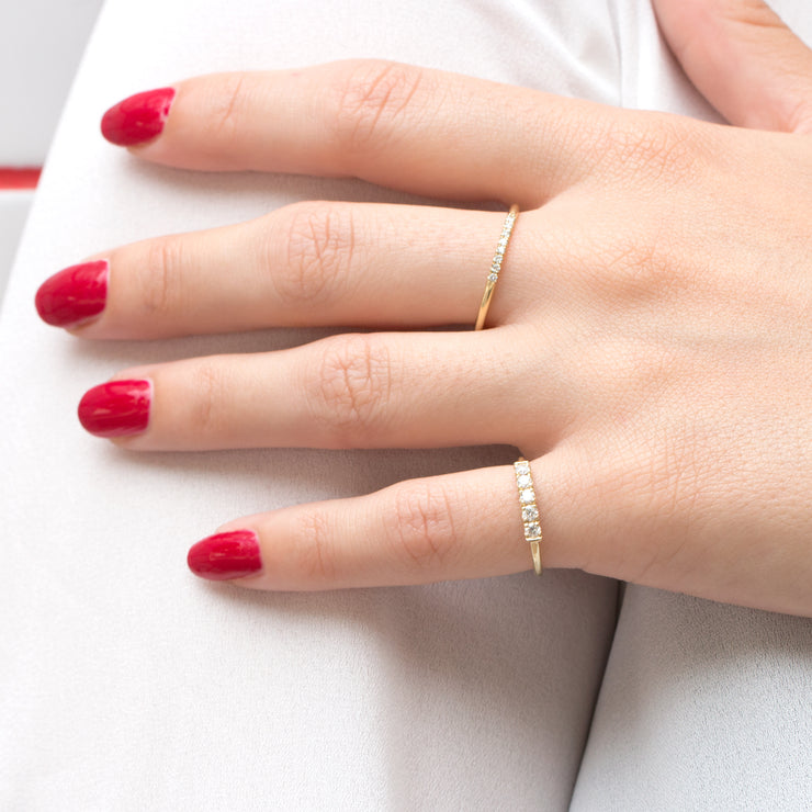 thin gold ring with white diamonds