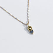 gold necklace with black diamond